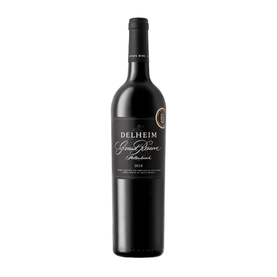Delheim Grand Reserve 2018 bottle showcasing Stellenbosch wine excellence.