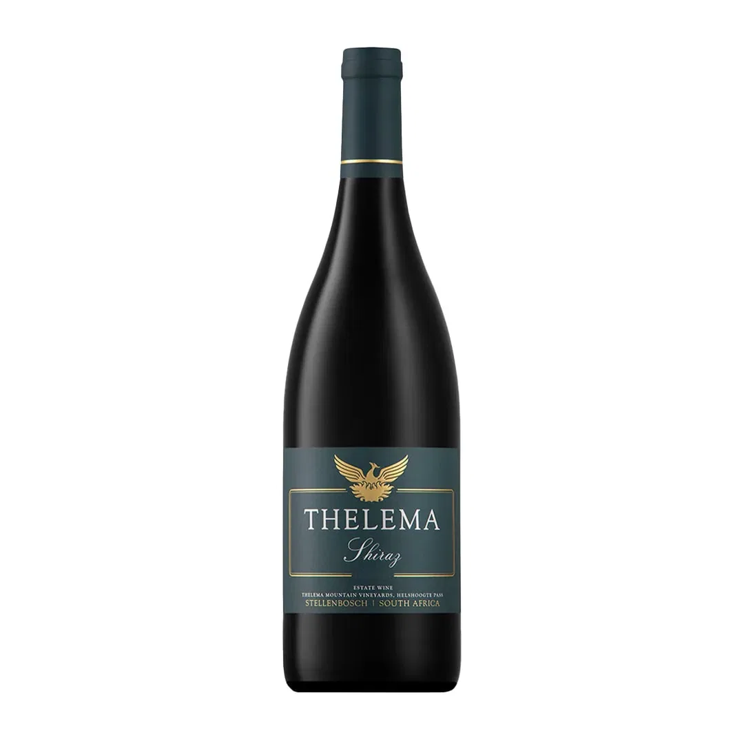Bottle Of Thelema Shiraz 2021 Showing A Deep Ruby Red Wine With Rich Dark Fruit Colour And Polished Visual Depth.