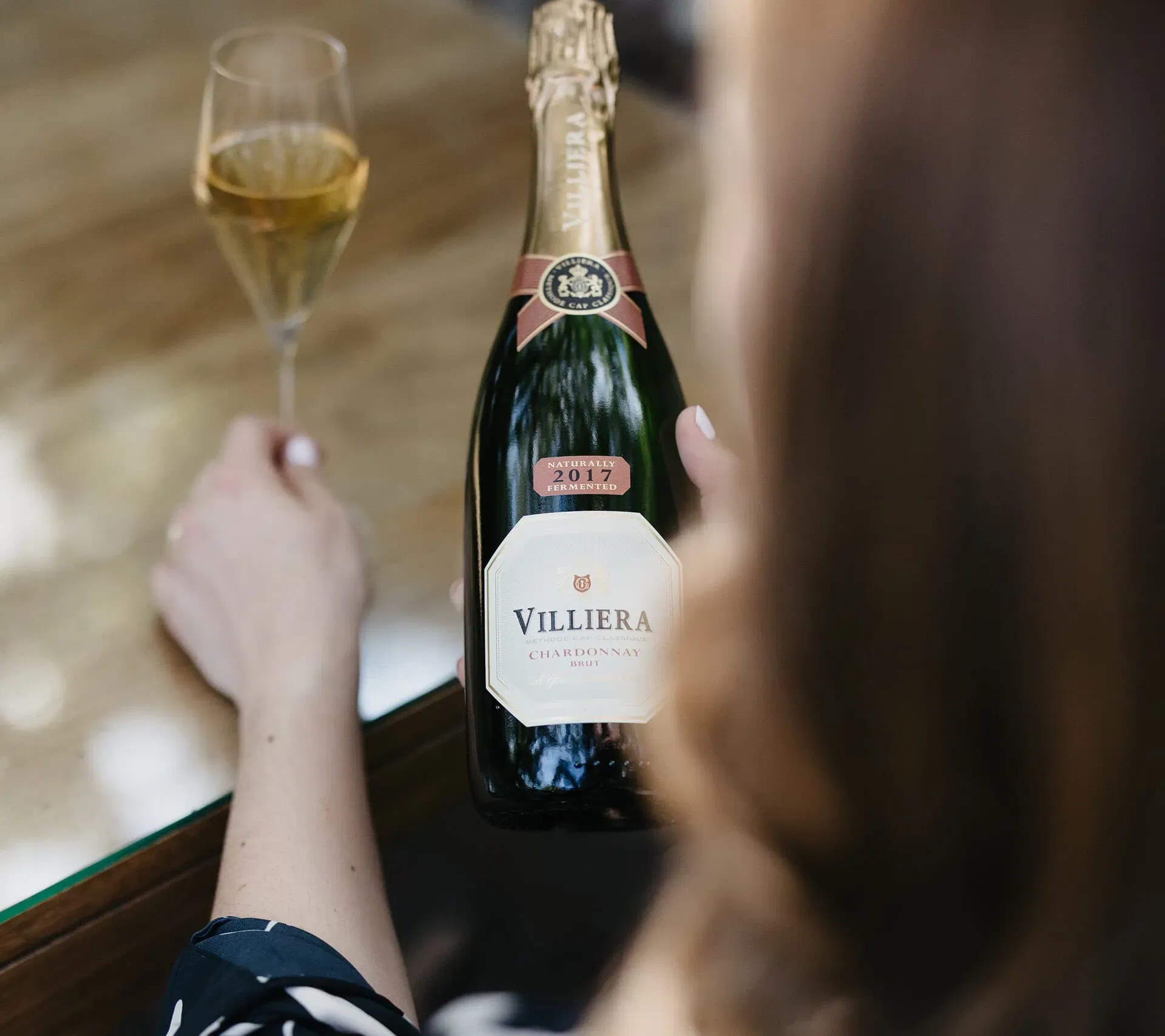 Villiera 2017 Chardonnay Brut With A Glass Of Sparkling Wine.