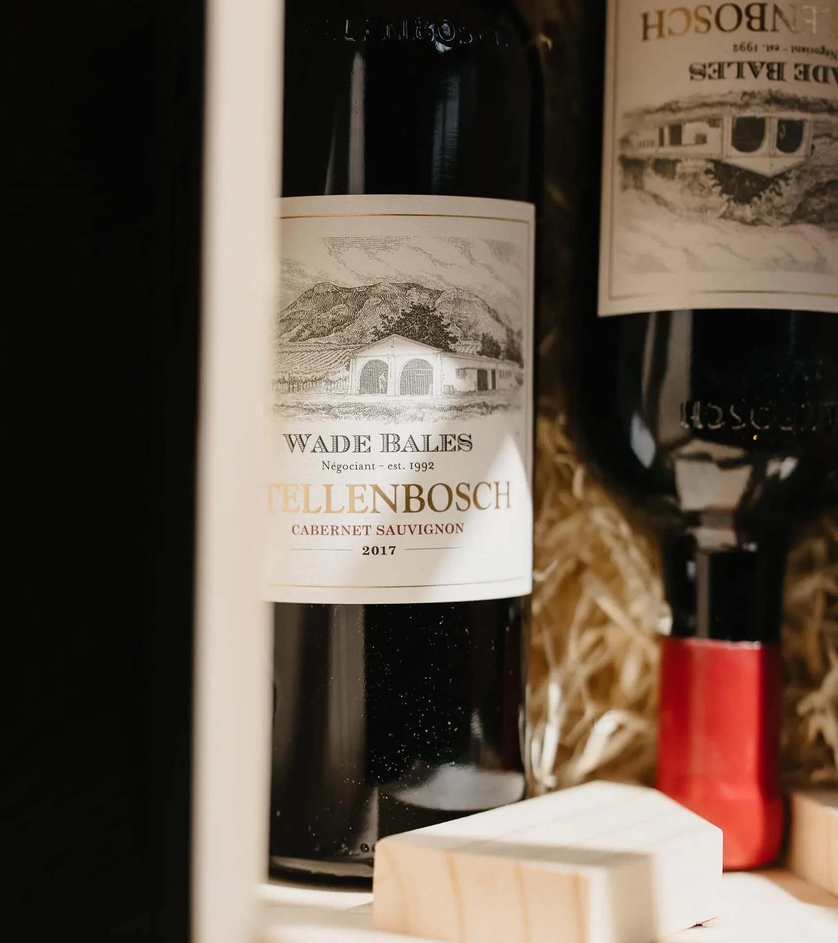 Alt Text: Wade Bales Stellenbosch Cabernet Sauvignon 2017 Bottle In Packaging, Showcasing South African Wine.
