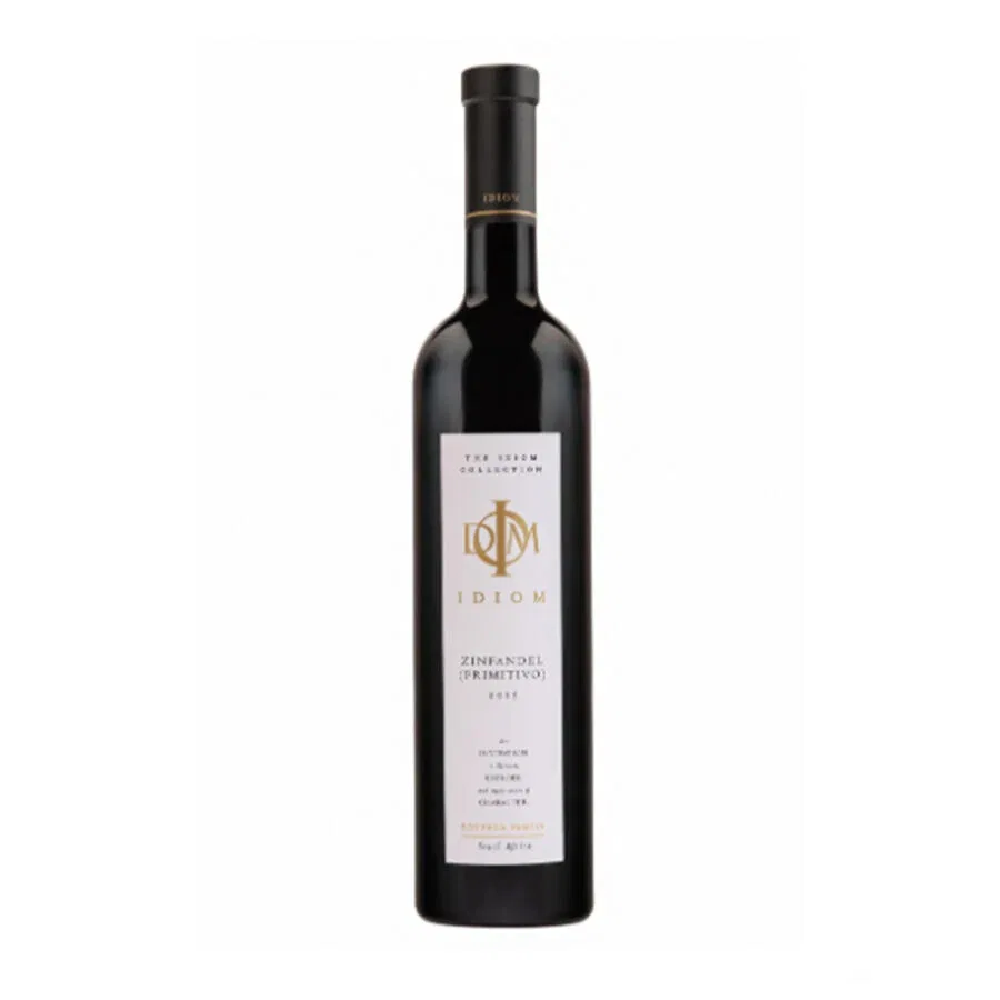 Idiom Zinfandel 2021 wine bottle, featuring the Idiom logo and Primitivo varietal.