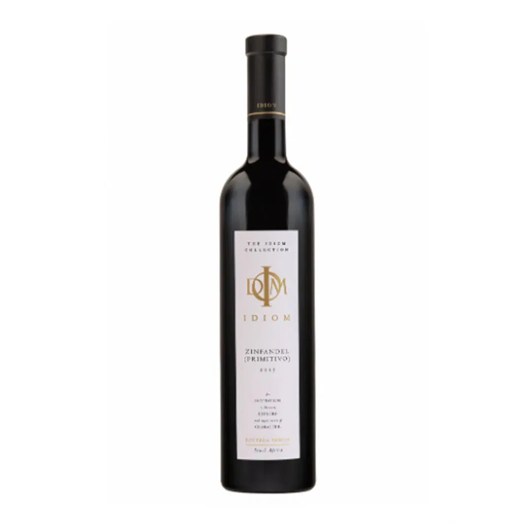 Idiom Zinfandel 2021 Wine Bottle, Featuring The Idiom Logo And Primitivo Varietal.
