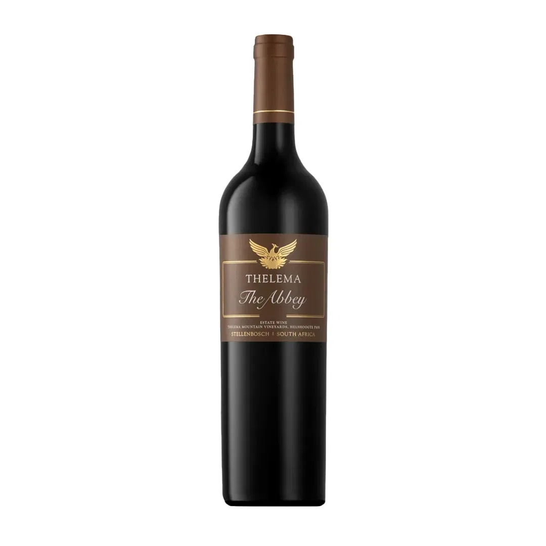 Thelema The Abbey 2022 Featuring A Rich Ruby Red Wine With Polished Clarity In A Dark Bottle With A Brown And Gold Label.