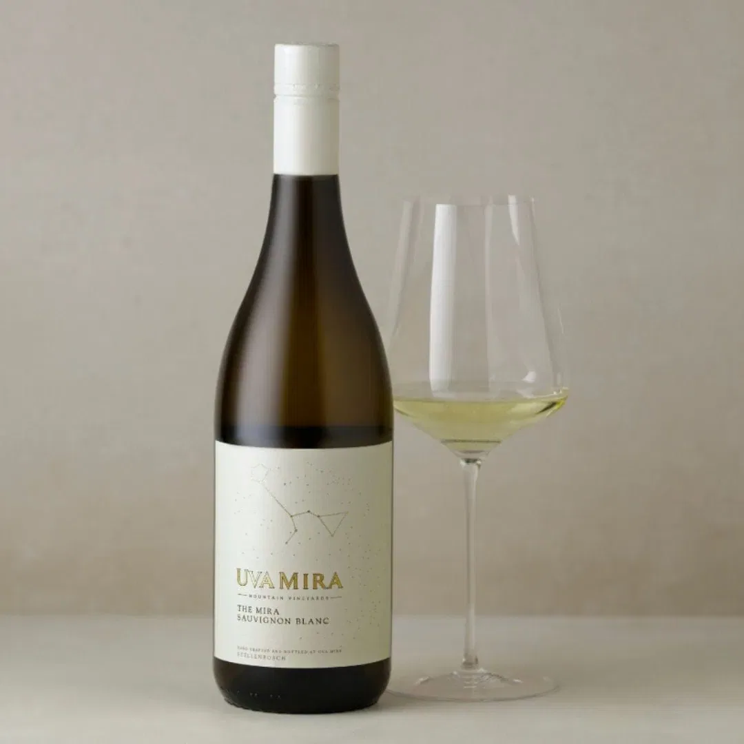 Uva Mira Sauvignon Blanc Bottle With A Glass Of Wine, Showcasing Stellenbosch Wine.