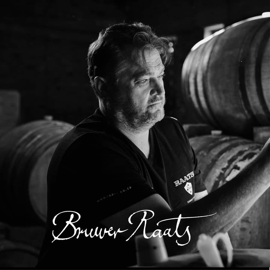 Winemaker Inspecting Barrels At Bruwer Raats Winery In Stellenbosch.